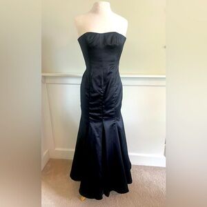 Black satin mermaid formal dress.  I am not sure of the brand.  Tag is gone